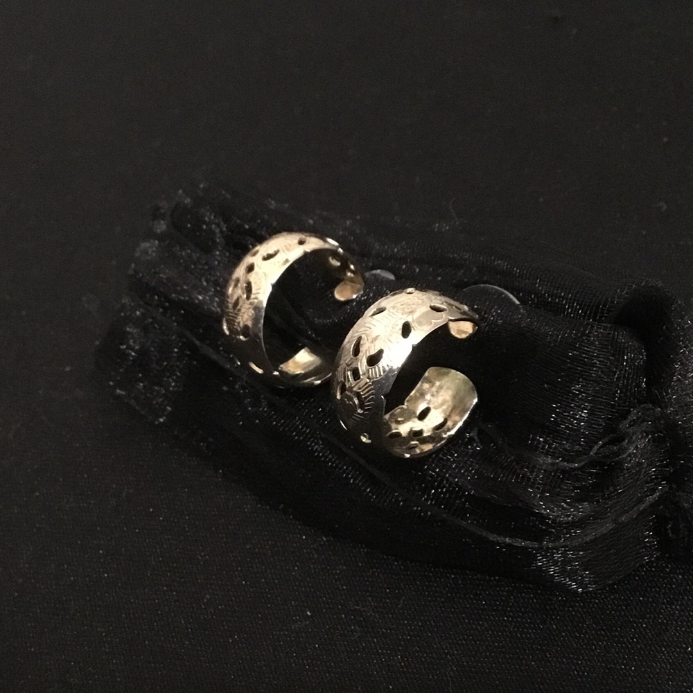 Gold tone Hoop Earrings.